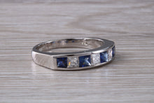 Load image into Gallery viewer, Traditional Blue Sapphire and Diamond set Eternity Ring