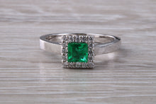 Load image into Gallery viewer, Emerald and Diamond Halo set Platinum Ring