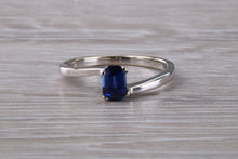 Load image into Gallery viewer, Emerald cut Royal Blue Sapphire set Twist Shank Ring