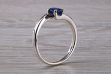 Load image into Gallery viewer, Emerald cut Royal Blue Sapphire set Twist Shank Ring