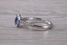 Load image into Gallery viewer, Absolutely Beautiful Blue Sapphire and Halo set Diamond Ring