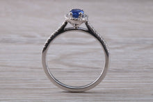 Load image into Gallery viewer, Absolutely Beautiful Blue Sapphire and Halo set Diamond Ring