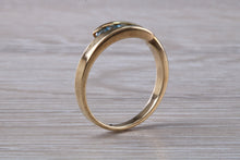 Load image into Gallery viewer, Sky Blue Topaz set Yellow Gold Twist Shank Ring
