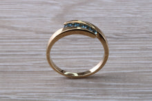 Load image into Gallery viewer, Sky Blue Topaz set Yellow Gold Twist Shank Ring