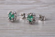 Load image into Gallery viewer, Emerald and Diamond Halo set 18ct White Gold Stud Earrings