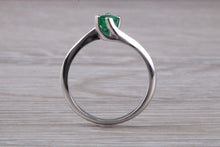 Load image into Gallery viewer, Half carat Round cut Emerald set Twist Solitaire