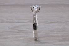 Load image into Gallery viewer, Platinum set Charles and Colvard Two carat Forever One Mossainte complemented with Natural Diamonds set Ring