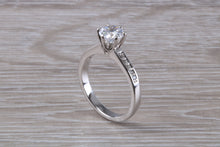 Load image into Gallery viewer, Platinum set Charles and Colvard Two carat Forever One Mossainte complemented with Natural Diamonds set Ring