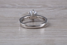 Load image into Gallery viewer, Platinum set Charles and Colvard Two carat Forever One Mossainte complemented with Natural Diamonds set Ring