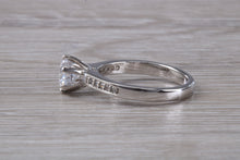 Load image into Gallery viewer, Platinum set Charles and Colvard Two carat Forever One Mossainte complemented with Natural Diamonds set Ring