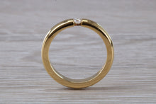 Load image into Gallery viewer, Chunky Yellow Gold Tension set Diamond Band