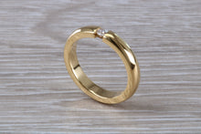 Load image into Gallery viewer, Chunky Yellow Gold Tension set Diamond Band