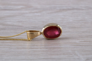 Oval cut Ruby set Yellow Gold Solitaire Necklace
