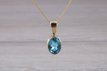 Load image into Gallery viewer, Swiss Blue Topaz set Yellow Gold Necklace