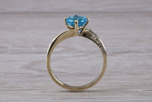 Load image into Gallery viewer, Blue Topaz and Diamond set White Gold Ring