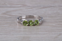 Load image into Gallery viewer, Round cut Peridot set 18ct White Gold Trilogy Ring