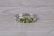 Load image into Gallery viewer, Round cut Peridot set 18ct White Gold Trilogy Ring