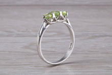 Load image into Gallery viewer, Round cut Peridot set 18ct White Gold Trilogy Ring