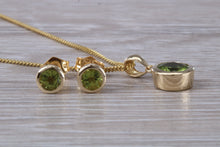 Load image into Gallery viewer, Round cut Peridot Earrings and Matching Necklace set in Yellow Gold