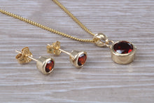 Load image into Gallery viewer, Round cut Garnet Earrings and Matching Necklace set in Yellow Gold