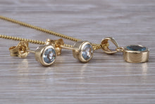 Load image into Gallery viewer, Round cut Aquamarine Matching Earrings and Necklace set in Yellow Gold