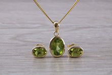 Load image into Gallery viewer, Oval cut Peridot Earrings and Matching Necklace set in Yellow Gold