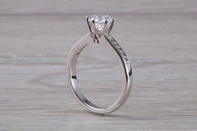 Load image into Gallery viewer, Platinum set Charles and Colvard Two carat Forever One Mossainte complemented with Natural Diamonds set Ring