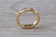 Load image into Gallery viewer, Chunky Yellow Gold Tension set Diamond Band