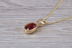 Oval cut Ruby set Yellow Gold Solitaire Necklace