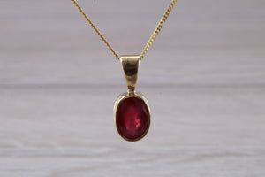 Oval cut Ruby set Yellow Gold Solitaire Necklace