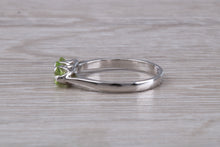 Load image into Gallery viewer, Round cut Peridot set 18ct White Gold Trilogy Ring
