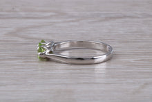 Load image into Gallery viewer, Round cut Peridot set 18ct White Gold Trilogy Ring