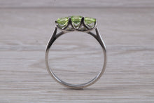 Load image into Gallery viewer, Round cut Peridot set 18ct White Gold Trilogy Ring