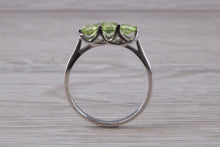 Load image into Gallery viewer, Round cut Peridot set 18ct White Gold Trilogy Ring
