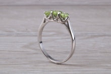 Load image into Gallery viewer, Round cut Peridot set 18ct White Gold Trilogy Ring