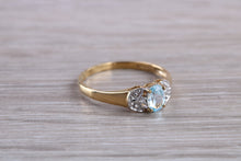 Load image into Gallery viewer, Blue Topaz and Diamond set Yellow Gold Ring