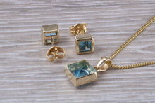 Load image into Gallery viewer, Square cut Blue Topaz Matching Earrings and Matching Necklace set in Yellow Gold