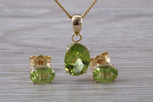 Load image into Gallery viewer, Oval cut Peridot Earrings and Matching Necklace set in Yellow Gold