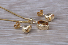 Load image into Gallery viewer, Oval cut Citrine Earrings and Matching Necklace set in Yellow Gold