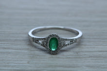 Load image into Gallery viewer, Emerald and Diamond Halo Ring