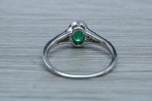 Load image into Gallery viewer, Emerald and Diamond Halo Ring