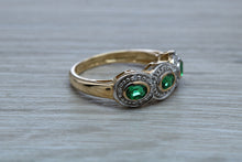 Load image into Gallery viewer, Three Emeralds and Diamonds set Yellow Gold Ring