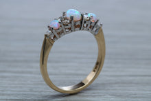 Load image into Gallery viewer, Fiery Opal and Diamonds set Yellow Gold Ring