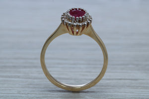 Oval cut Ruby and Diamond Cluster Ring