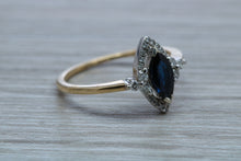 Load image into Gallery viewer, Marquise cut Halo set Blue Sapphire and Diamond Ring