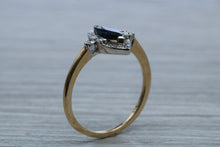 Load image into Gallery viewer, Marquise cut Halo set Blue Sapphire and Diamond Ring