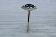 Load image into Gallery viewer, Marquise cut Halo set Blue Sapphire and Diamond Ring