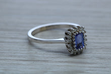 Load image into Gallery viewer, One carat AAA Grade Tanzanite and Diamond Halo Ring