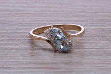 Load image into Gallery viewer, Sky Blue Topaz and Diamond set Yellow Gold Ring