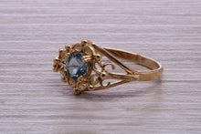 Load image into Gallery viewer, Swiss Blue Topaz set Yellow Gold Ring